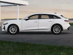 Białe Audi A5 B10 Avant stoi przed nowoczesnym budynkiem, z widokiem na wodę.
