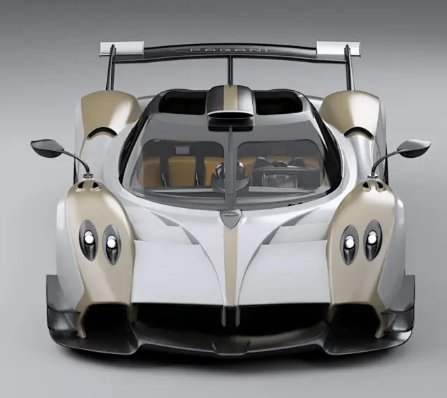 Pagani Huayra w kolorze białym ze złotymi akcentami, z dużym tylnym skrzydłem. Cena tego cudu motoryzacji jest astronomiczna.